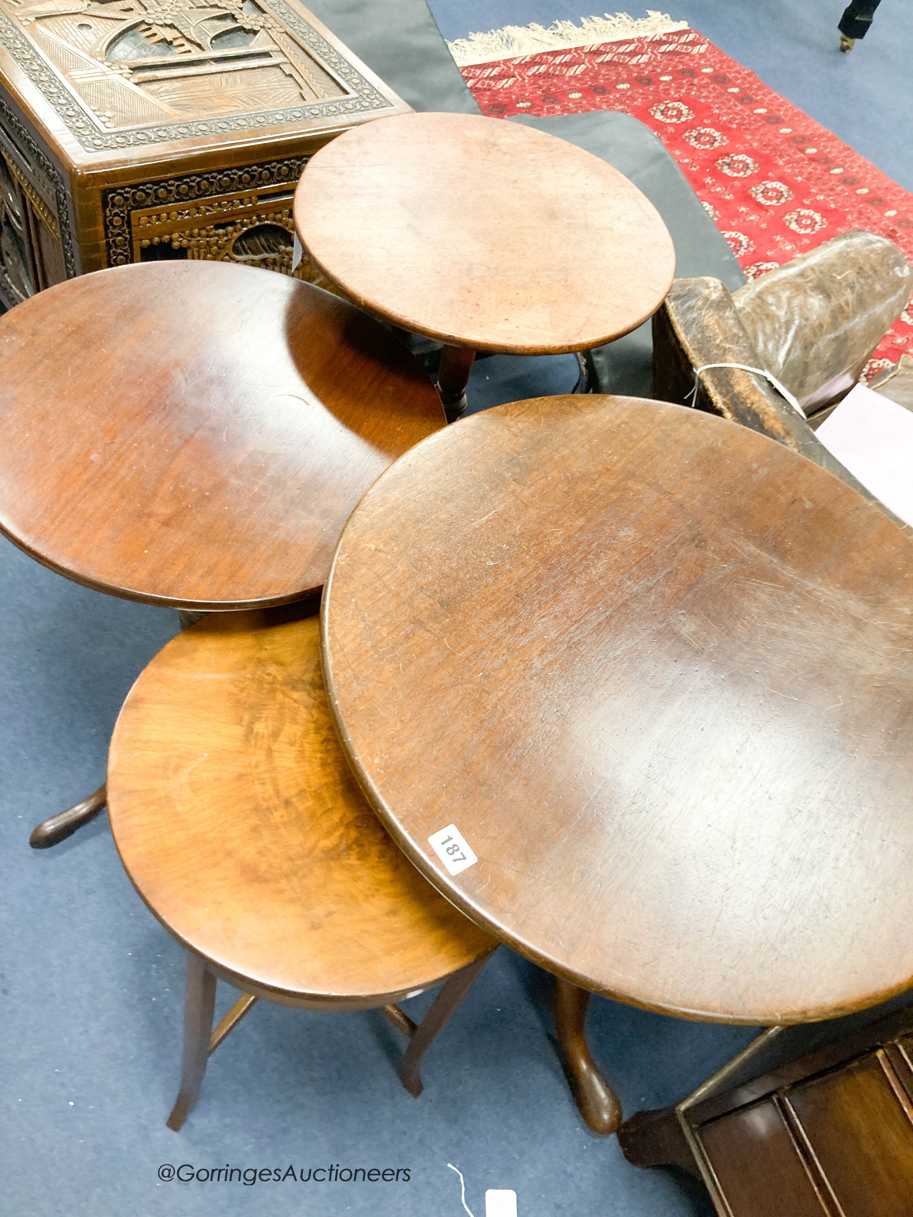 Three George III and later circular mahogany tripod tables, largest diameter 60cm together with a 1920's walnut circular occasional table